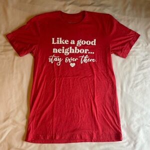 “Like a Good Neighbor Stay Over There” Red Graphic T-Shirt – Size Medium